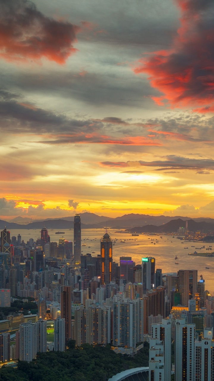 Обои городской пейзаж, городской район, город, метрополия, закат в разрешении 720x1280