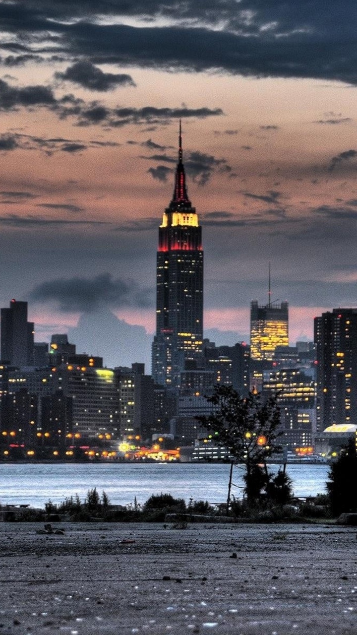 Обои линия горизонта, городской пейзаж, город, городской район, небоскреб в разрешении 720x1280