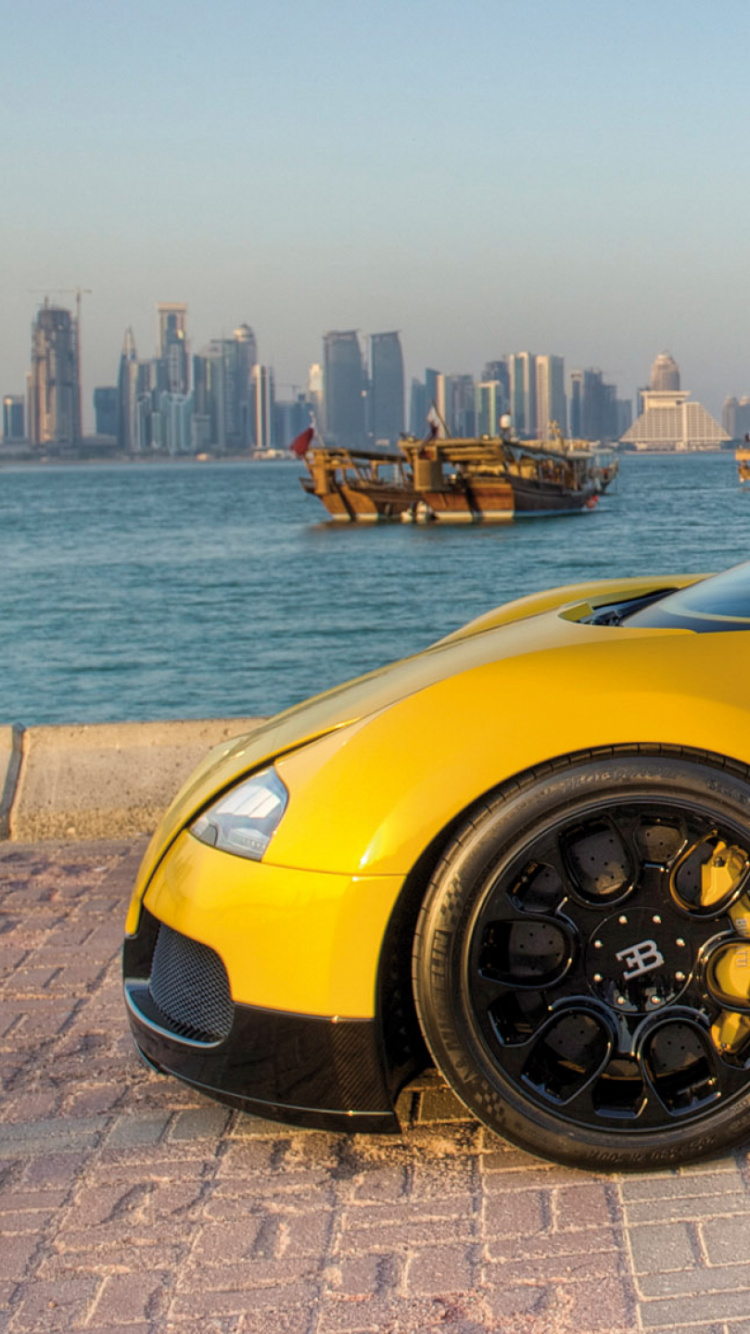 Обои bugatti, суперкар, Бугатти вейрон, спорткар, желтый в разрешении 750x1334