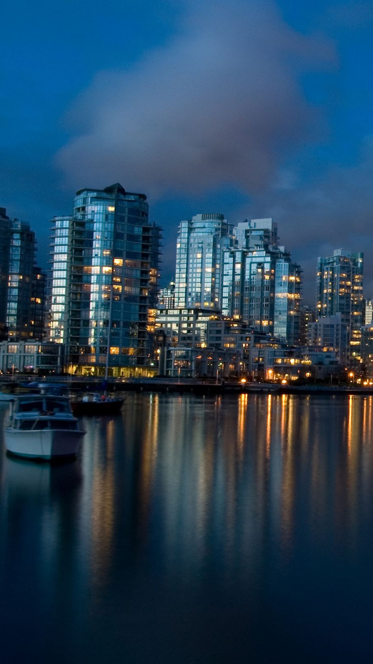 Обои небоскреб, линия горизонта, городской пейзаж, город, отражение в разрешении 750x1334