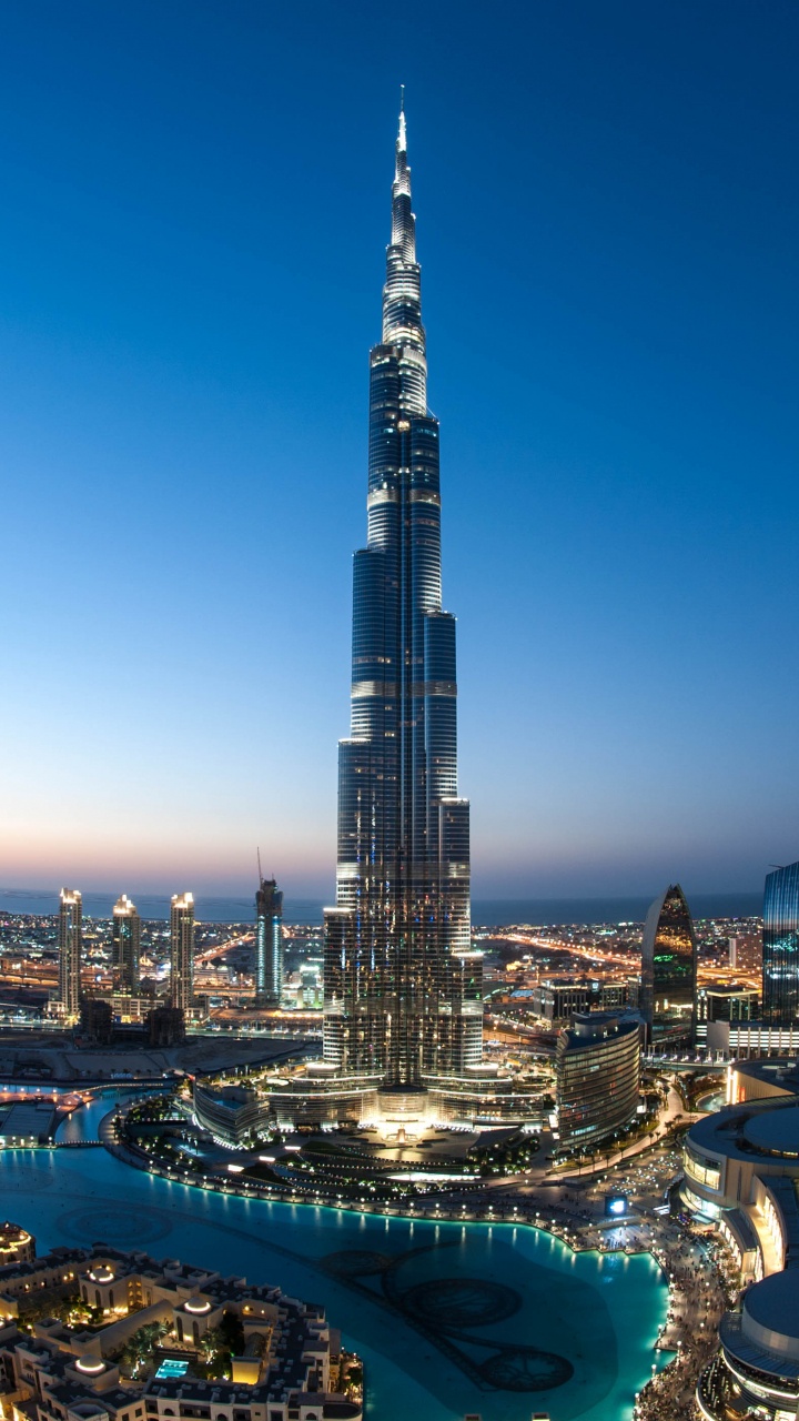 Обои вышка, городской пейзаж, небоскреб, город, городской район в разрешении 720x1280