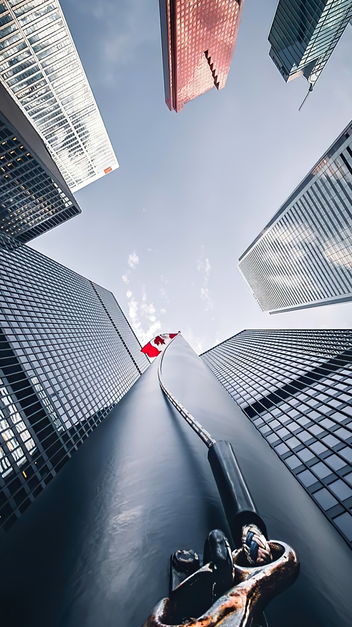 Обои небоскреб, здание, дневное время, белые, мир в разрешении 720x1280