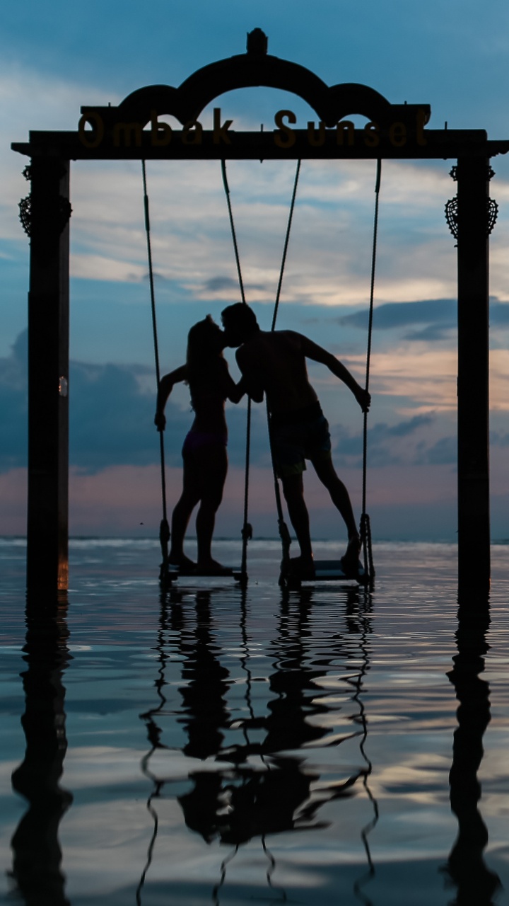 Обои море, закат, вода, отражение, горизонт в разрешении 720x1280