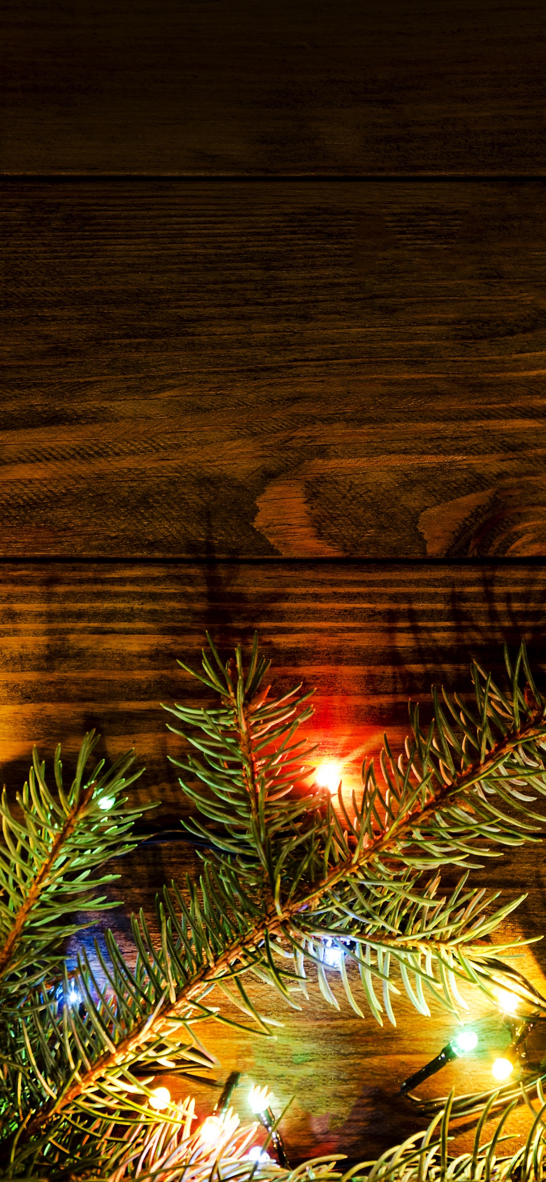 Обои Рождественский день, Рождественские огни, дерево, свет, освещение в разрешении 1125x2436