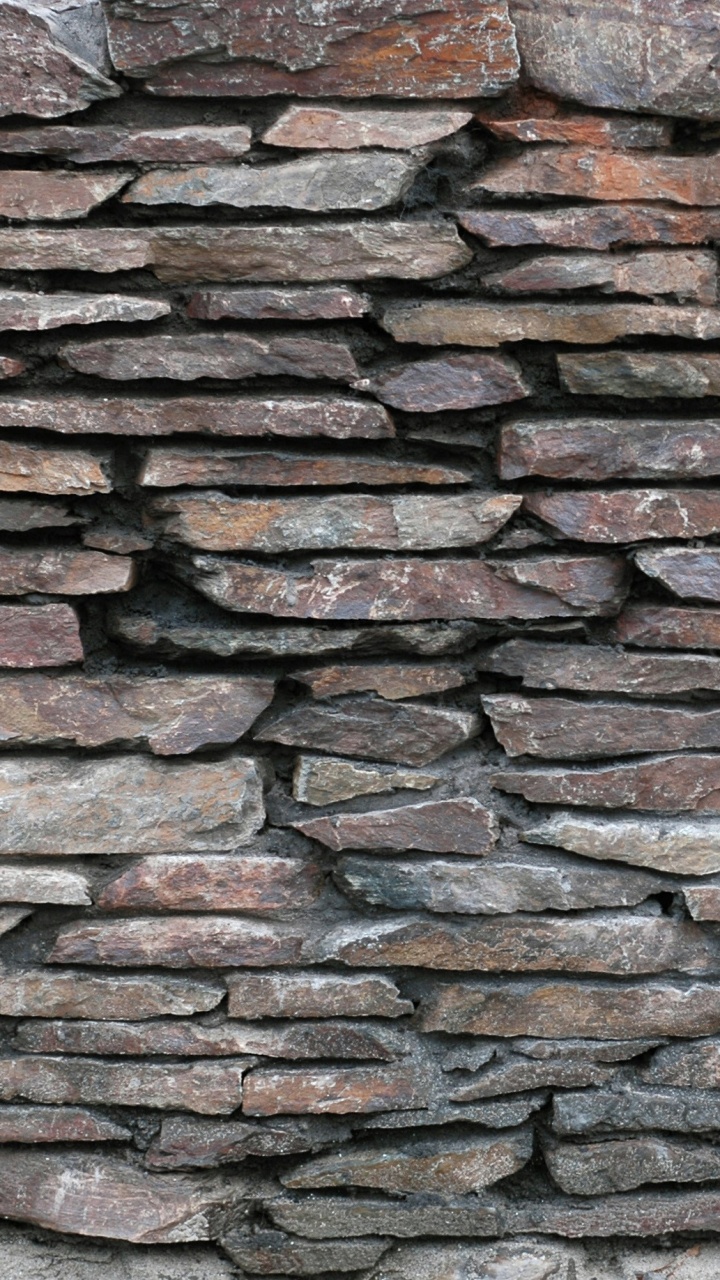 Обои кирпичная кладка, каменная стена, кирпич, стена, каменщик в разрешении 720x1280