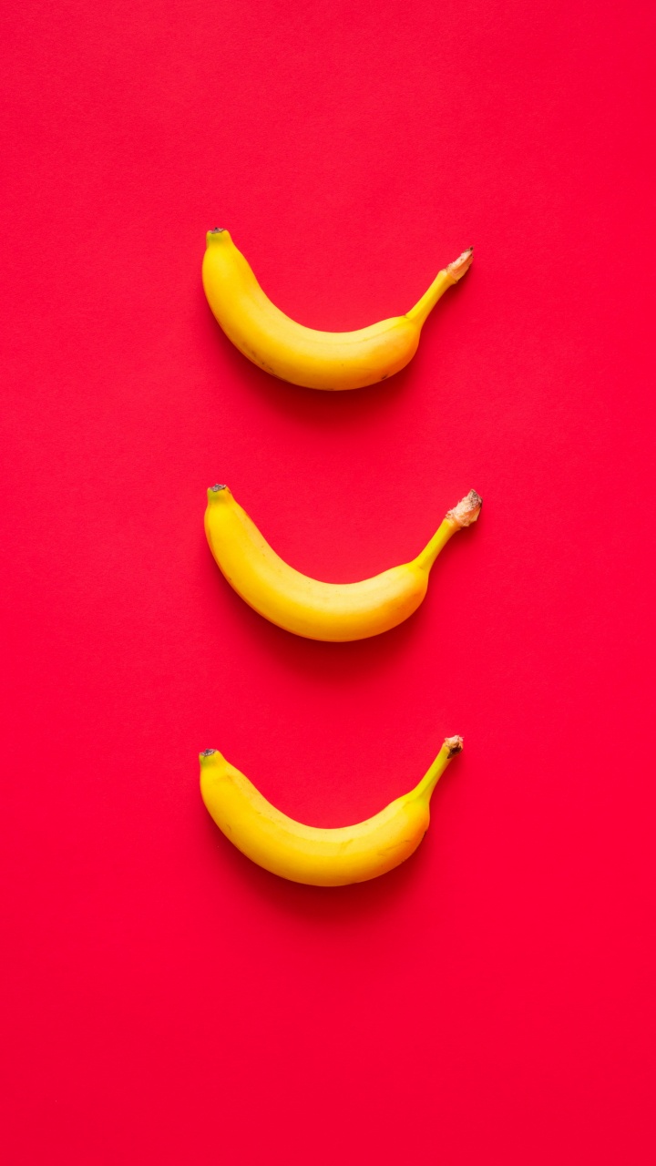 Обои Оранжевый цвет, банан, голова, растение, глаз в разрешении 720x1280