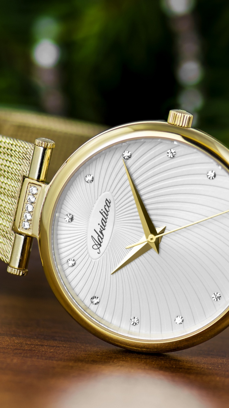 Обои подарок, золото, ювелирные изделия, часы, металл в разрешении 750x1334