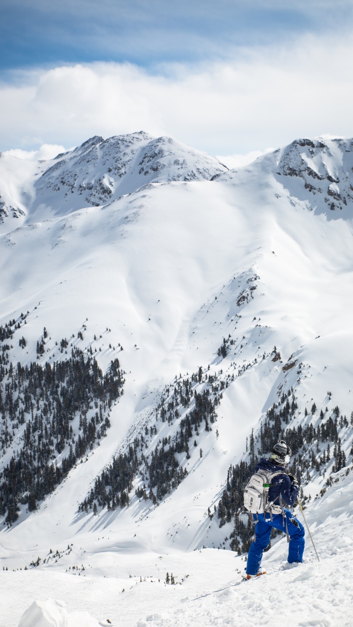 Обои лыжи, лыжня, зимние виды спорта, снег, горный рельеф в разрешении 720x1280