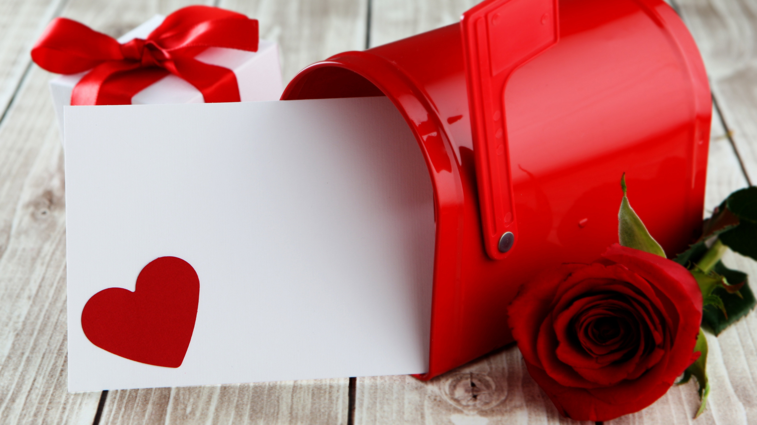 Обои День Святого Валентина, сердце, красный цвет, лента, любовь в разрешении 2560x1440