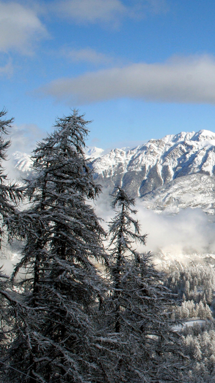 Обои зима, гора, снег, горный рельеф, горный хребет в разрешении 750x1334