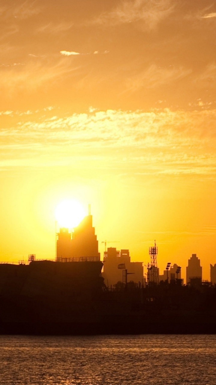 Обои город, линия горизонта, послесвечение, закат, городской пейзаж в разрешении 720x1280