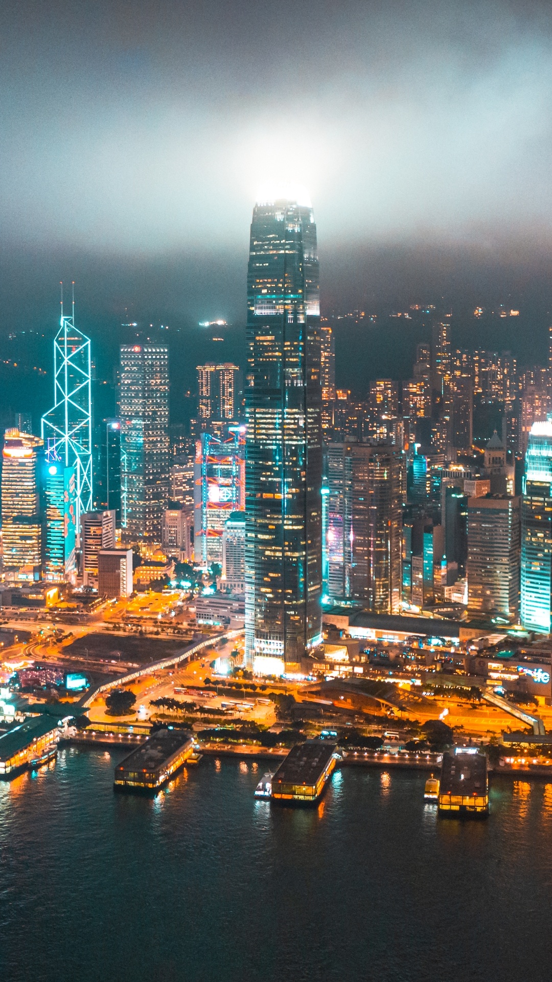 Обои городской пейзаж, небоскреб, здание, вода, свет в разрешении 1080x1920