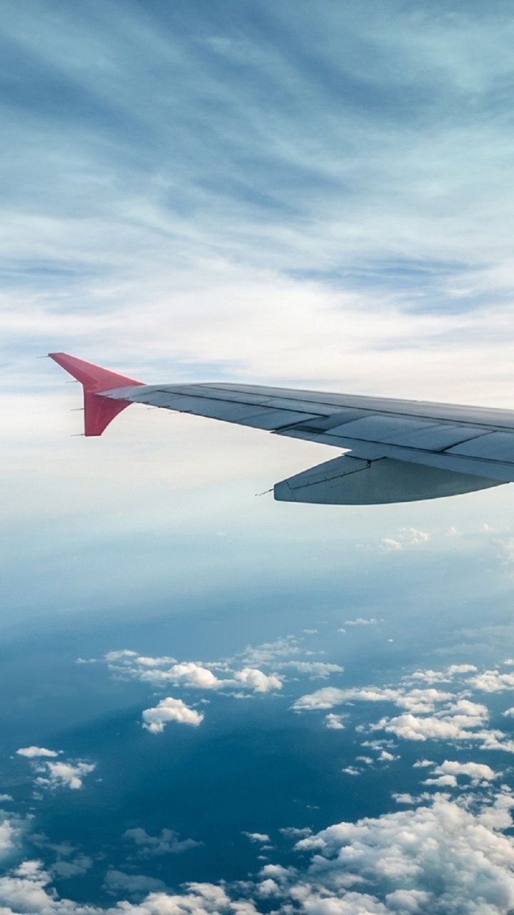 Обои самолет, полет, самолеты, воздушное путешествие, авиакомпания в разрешении 720x1280