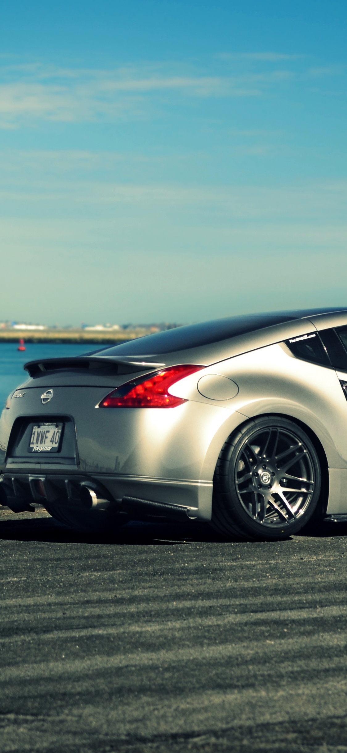 Обои nissan 370z, Ниссан, авто, спорткар, колесо в разрешении 1125x2436