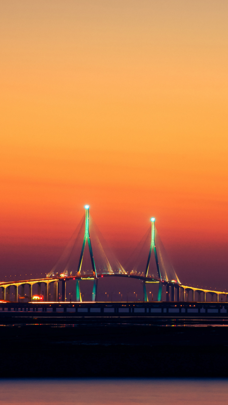 Обои закат, сумрак, мост, горизонт, вода в разрешении 750x1334