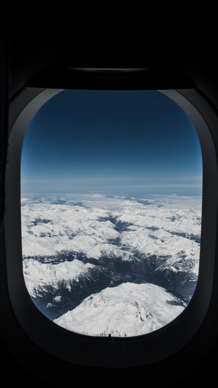 Обои окно, самолет, полет, иллюминатор, синий в разрешении 750x1334