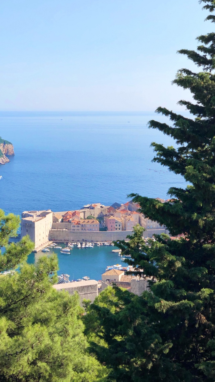 Обои побережье, пейзажи гор, водоем, лазурный, вечнозеленое растение в разрешении 720x1280