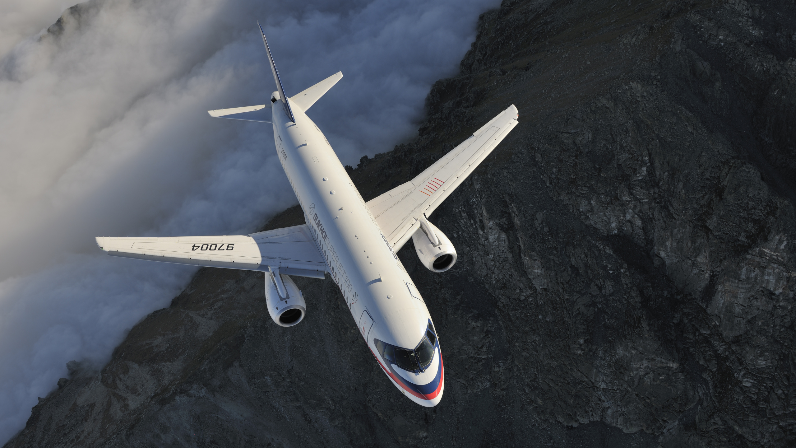 Обои Сухой Суперджет 100, самолет, самолеты, авиалайнер, авиация в разрешении 2560x1440