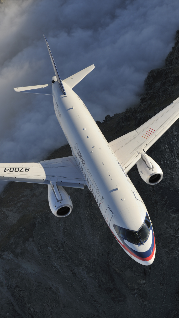 Обои Сухой Суперджет 100, самолет, самолеты, авиалайнер, авиация в разрешении 750x1334