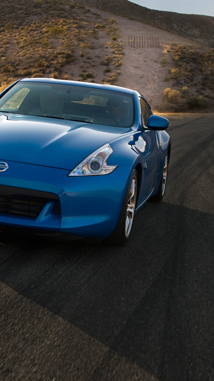 Обои Ниссан 370z вышли синий, Ниссан, авто, 2012 Ниссан 370z вышли, спорткар в разрешении 750x1334