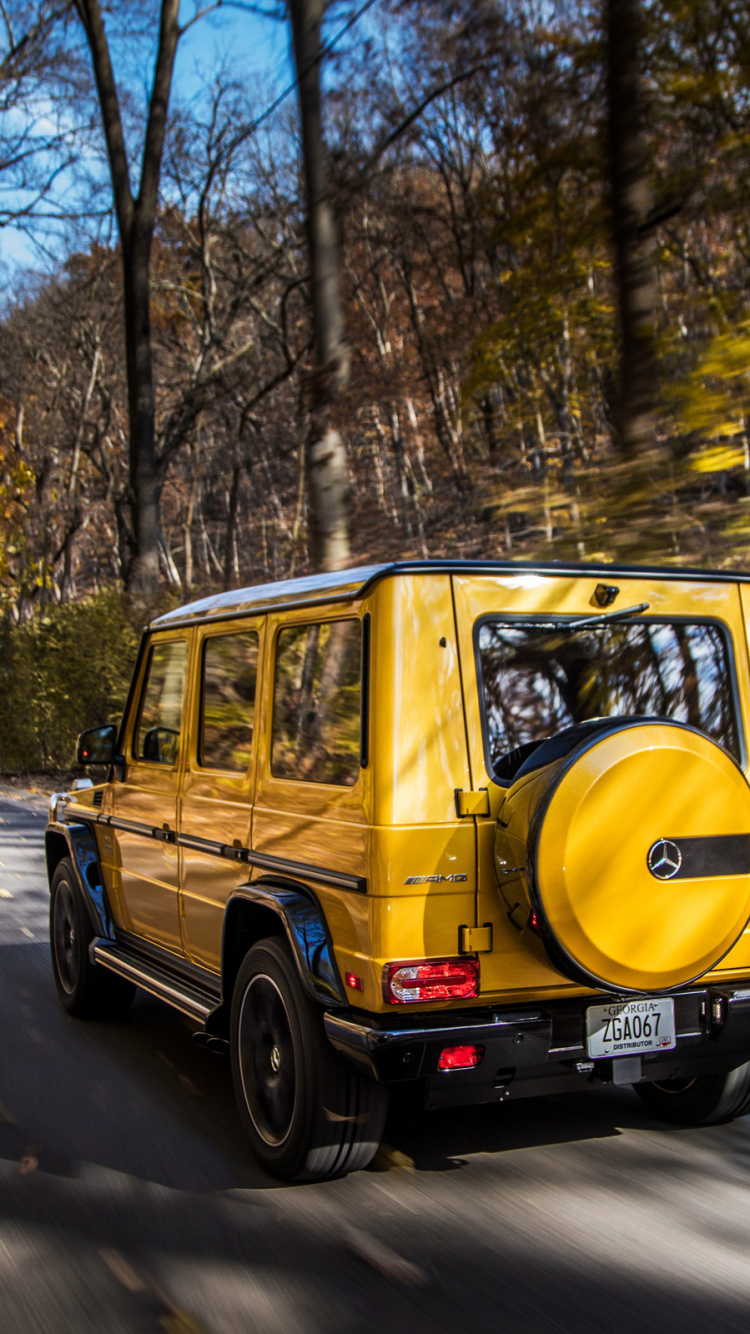 Обои авто, Мерседес-Бенц g63 АМГ 6х6, желтый, Мерседес АМГ, автомобиль в разрешении 750x1334