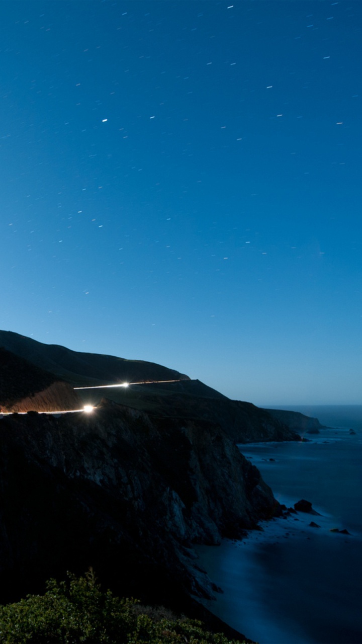 Обои море, ночь, горизонт, побережье, вода в разрешении 720x1280