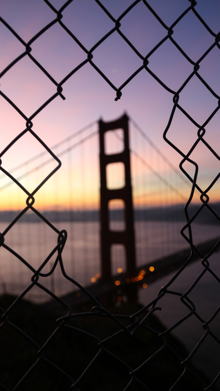Обои мост Golden Gate, мост, забор, ограждать провода, закат в разрешении 720x1280