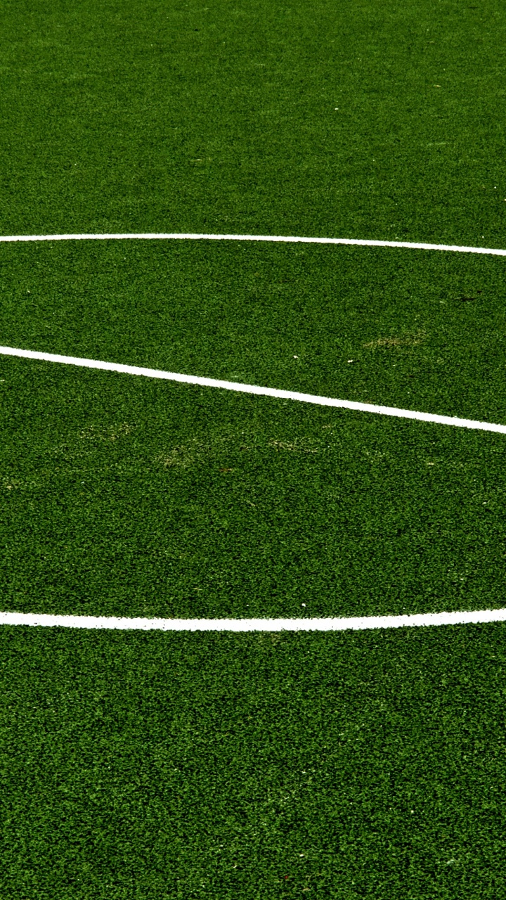 Обои футбол, футбольное поле, командный вид спорта, спортивные объекты, зеленый в разрешении 720x1280