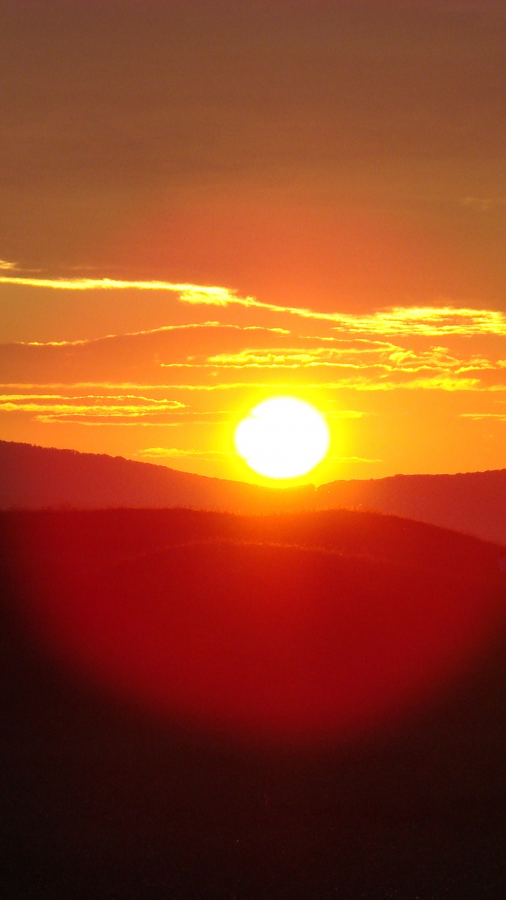 Обои послесвечение, восход солнца, рассвет, закат, солнце в разрешении 720x1280