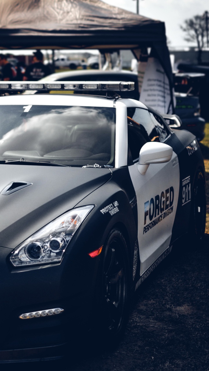 Обои nissan gt r, легковые автомобили, колесо, шина, решетка в разрешении 720x1280