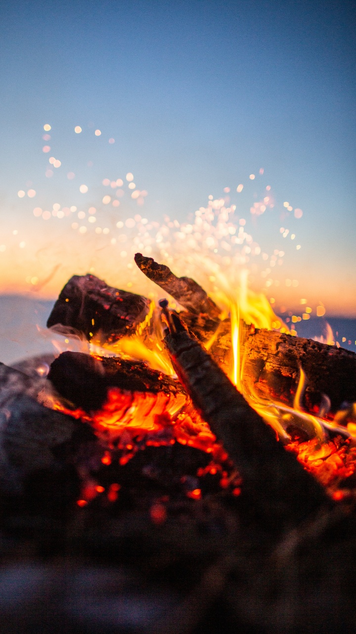 Обои рок, тепло, огонь, атмосфера, видео в разрешении 720x1280