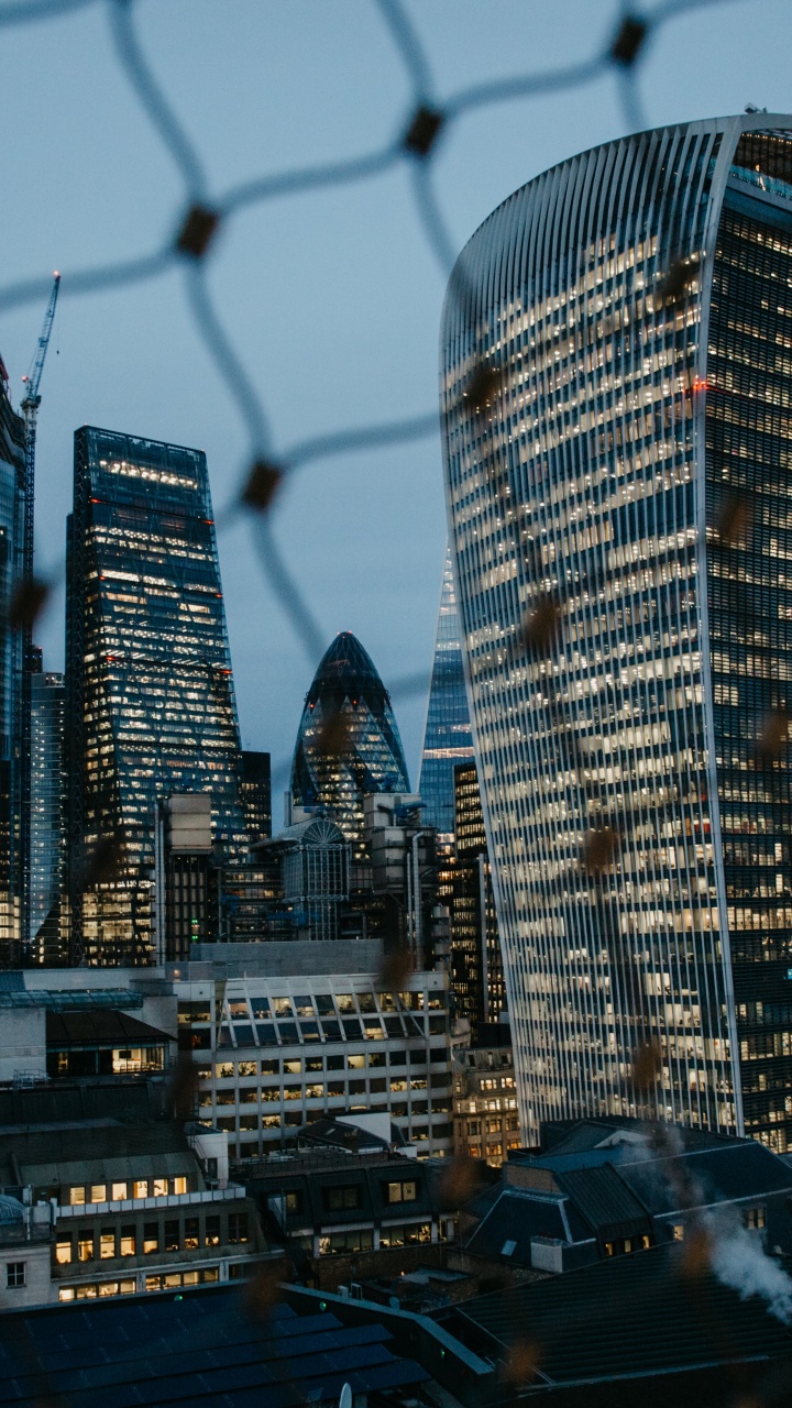 Обои городской пейзаж, линия горизонта, метрополия, осколок, небоскреб в разрешении 720x1280