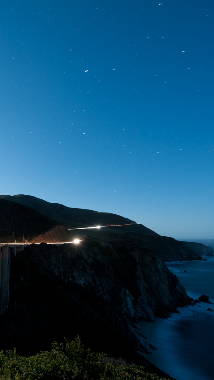 Обои море, ночь, горизонт, побережье, вода в разрешении 720x1280