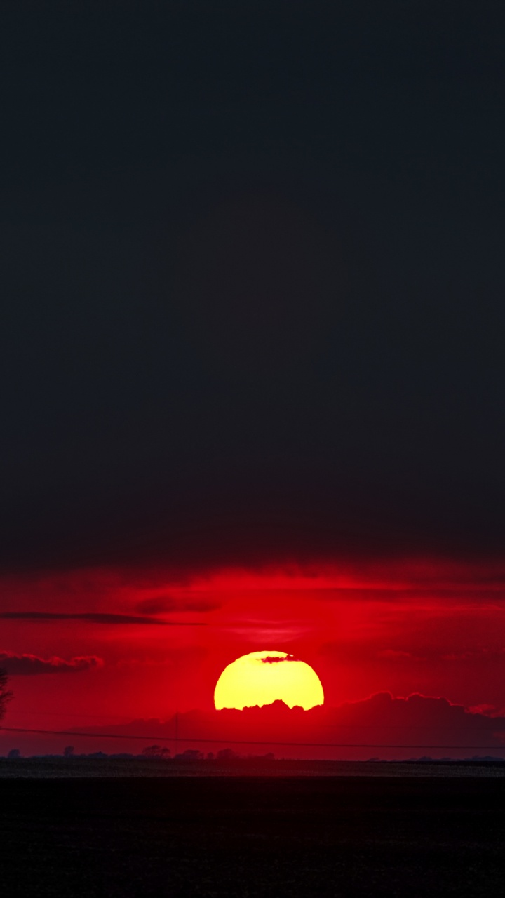Обои закат, горизонт, восход солнца, красный цвет, послесвечение в разрешении 720x1280
