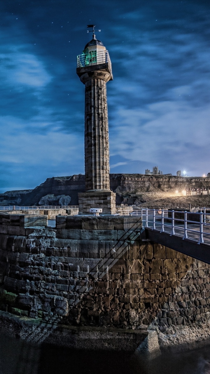 Обои вышка, вода, ориентир, море, облака в разрешении 720x1280