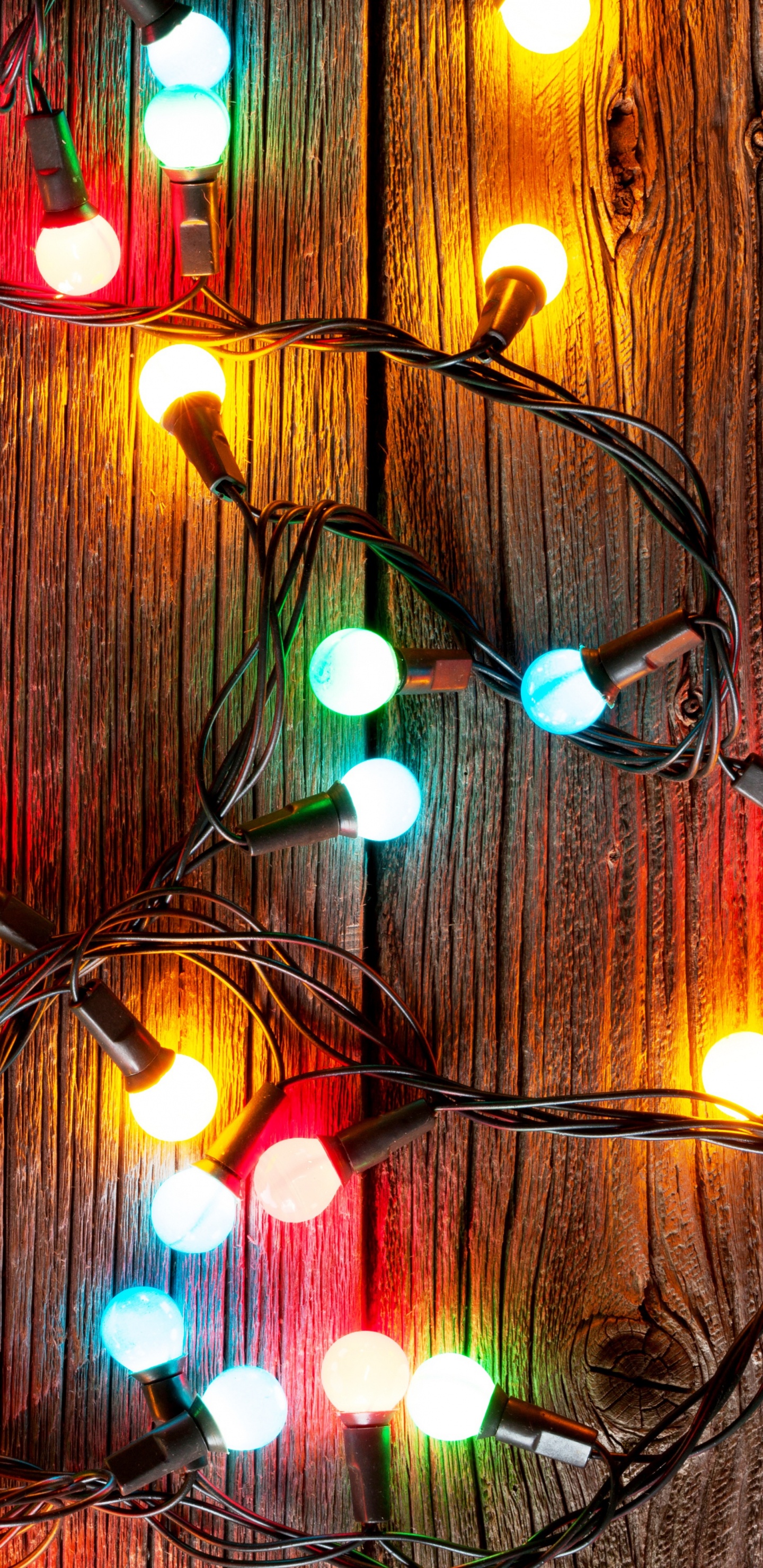 Обои Рождественские огни, Рождественский день, освещение, праздник, Рождество в разрешении 1440x2960