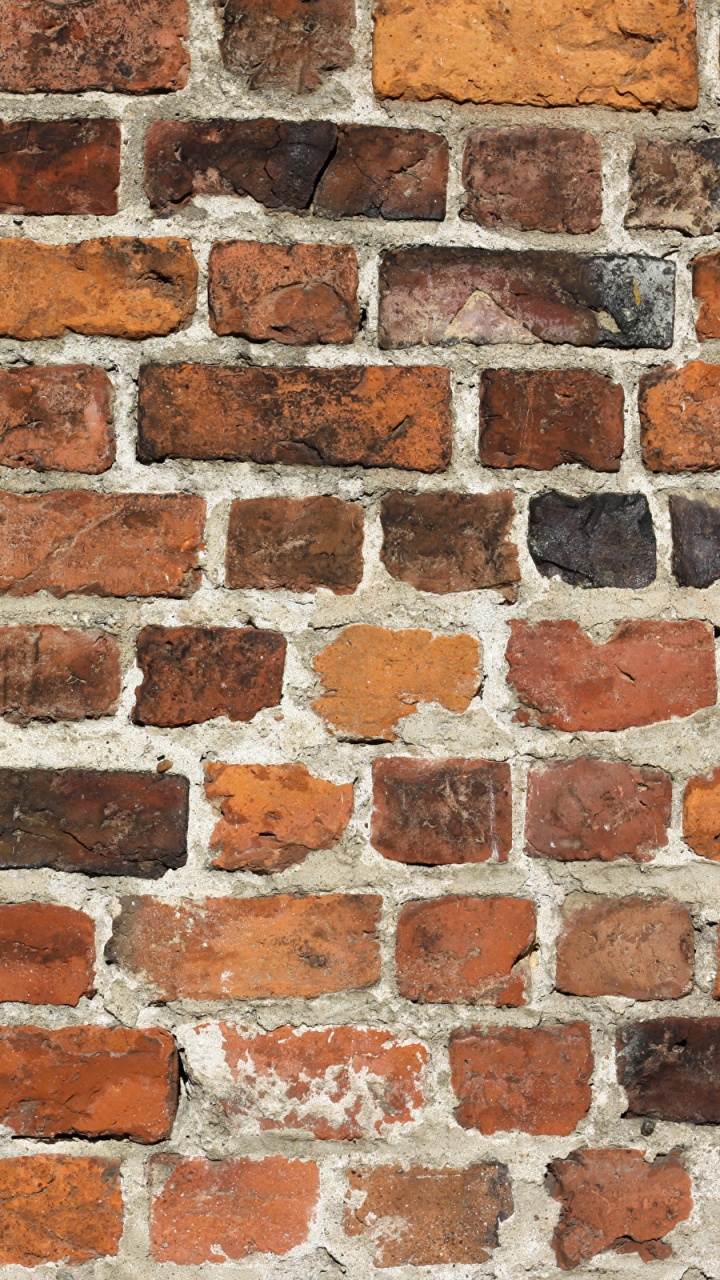 Обои кирпич, стена, кирпичная кладка, каменная стена, каменщик в разрешении 720x1280