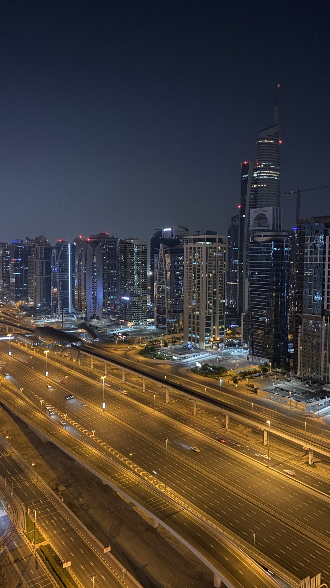 Обои Дубай, ночь, дорога, метрополия, город в разрешении 1080x1920