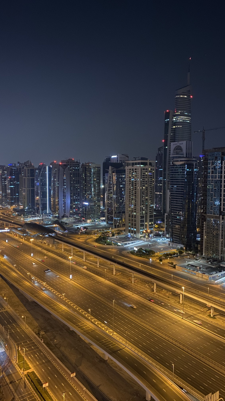 Обои Дубай, ночь, дорога, метрополия, город в разрешении 750x1334