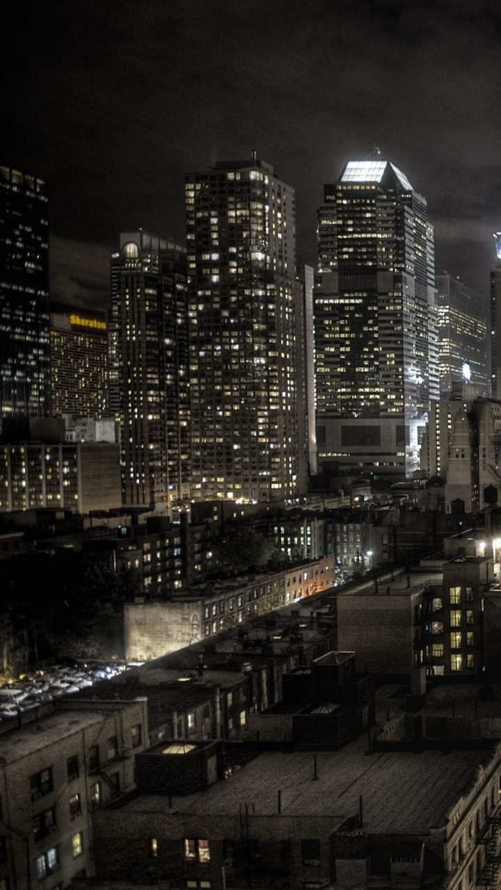 Обои городской пейзаж, город, городской район, небоскреб, ночь в разрешении 720x1280