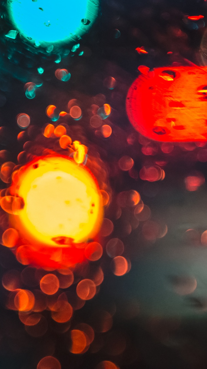 Обои свет, боке, авто, освещение, Апельсин в разрешении 720x1280