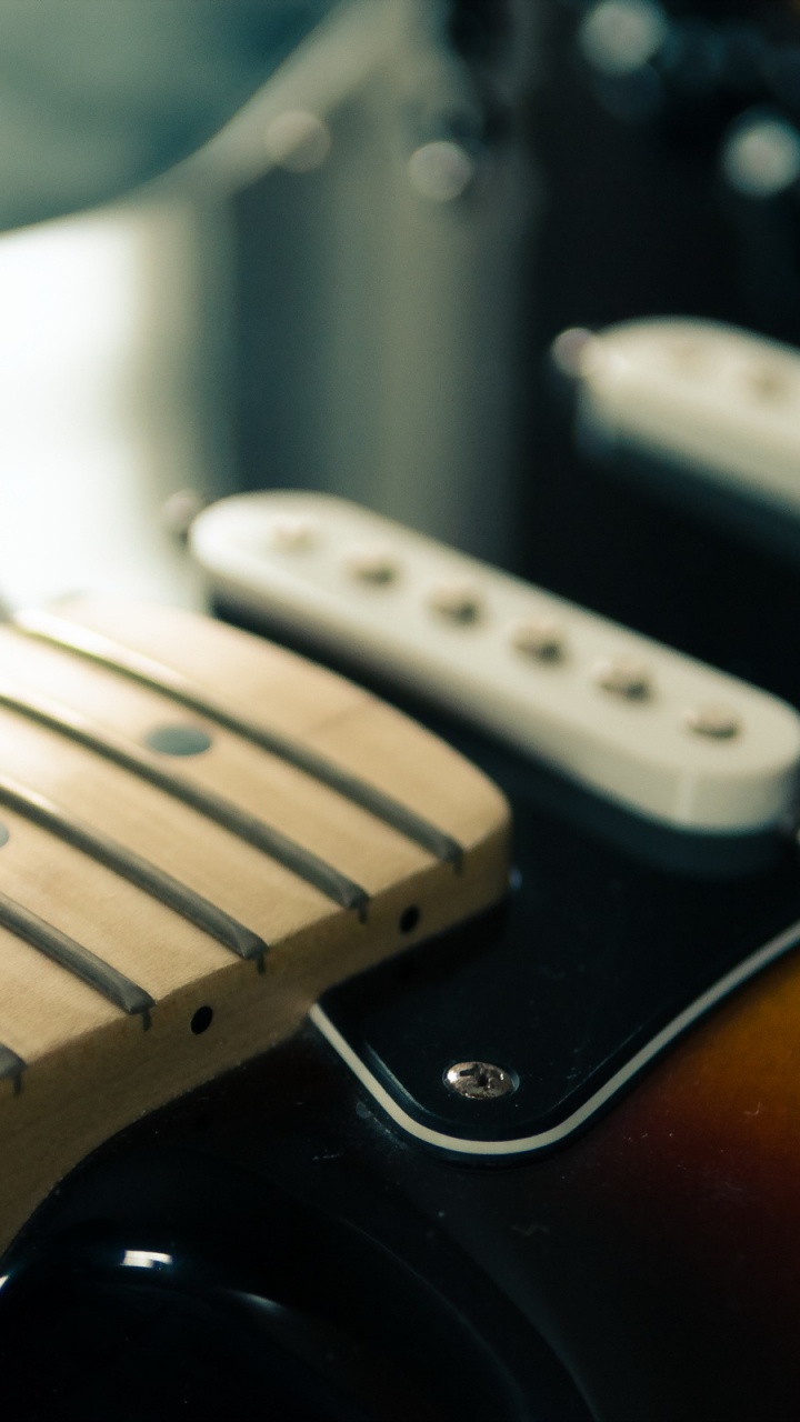 Обои гитара, струнный инструмент, электрогитара, щипковые струнные инструменты, музыкальный инструмент в разрешении 720x1280