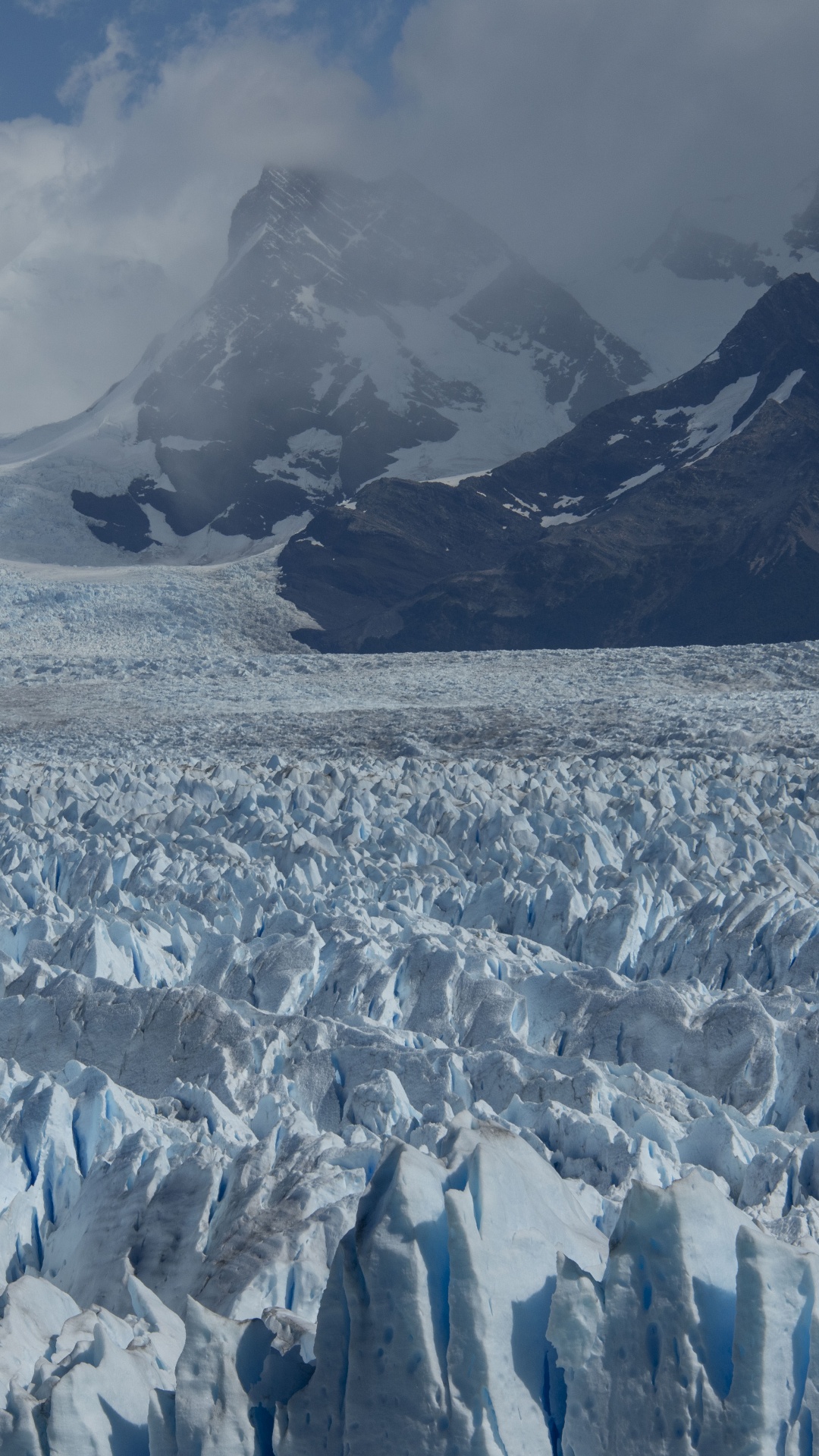 Обои ледник, айсберг, лед, ледниковое озеро, горный рельеф в разрешении 1080x1920