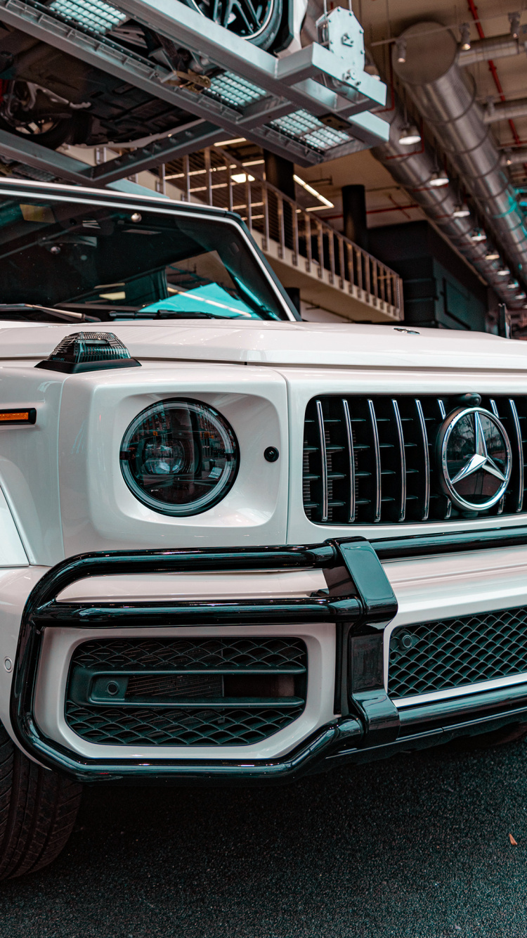 Обои бампер, легковые автомобили, шина, решетка, автомобильное освещение в разрешении 750x1334