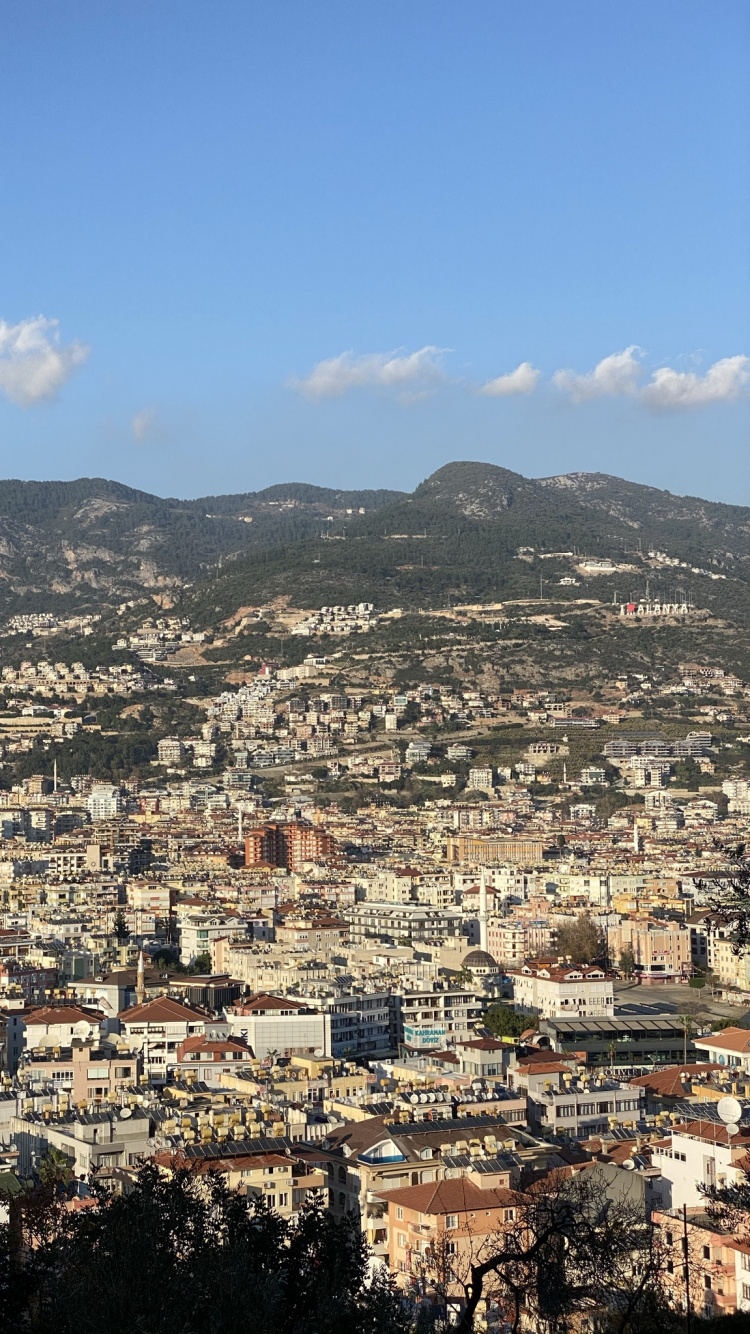 Обои облако, атмосфера, здание, гора, лазурный в разрешении 750x1334