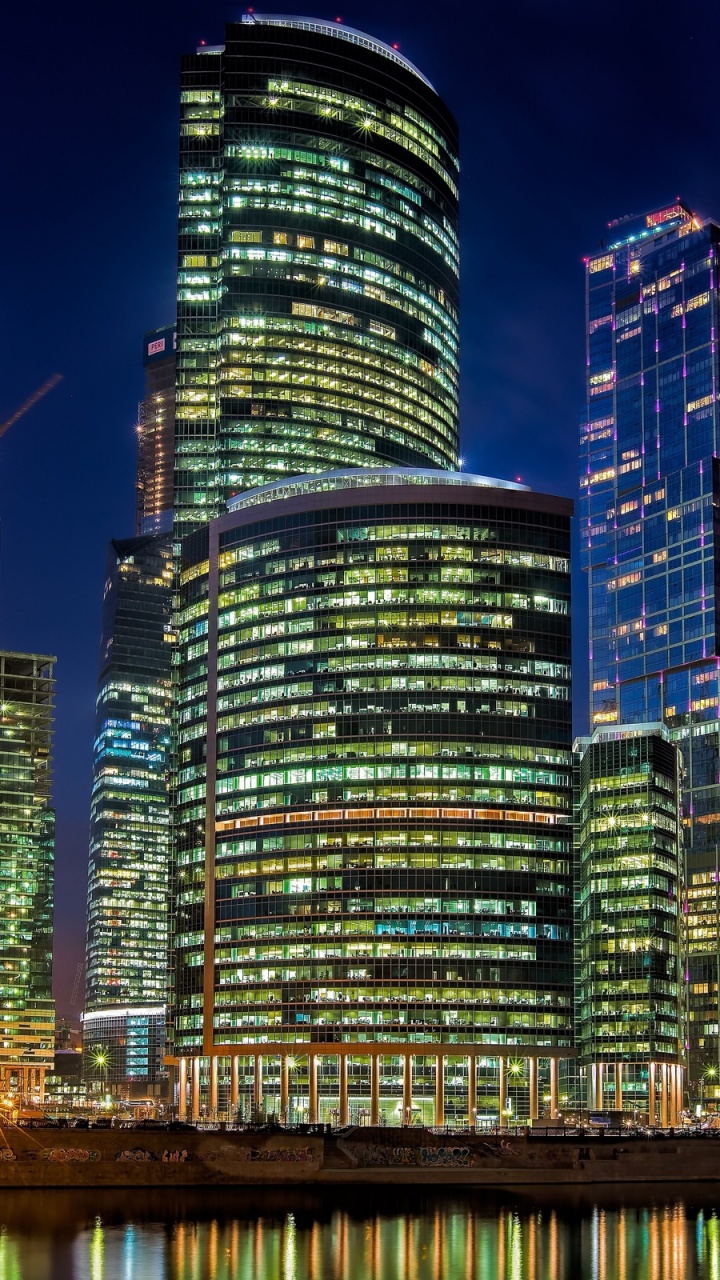 Обои город, городской пейзаж, метрополия, небоскреб, городской район в разрешении 720x1280