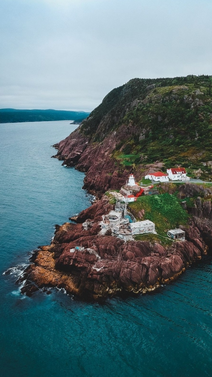 Обои море, вода, гора, природный ландшафт, растение в разрешении 720x1280