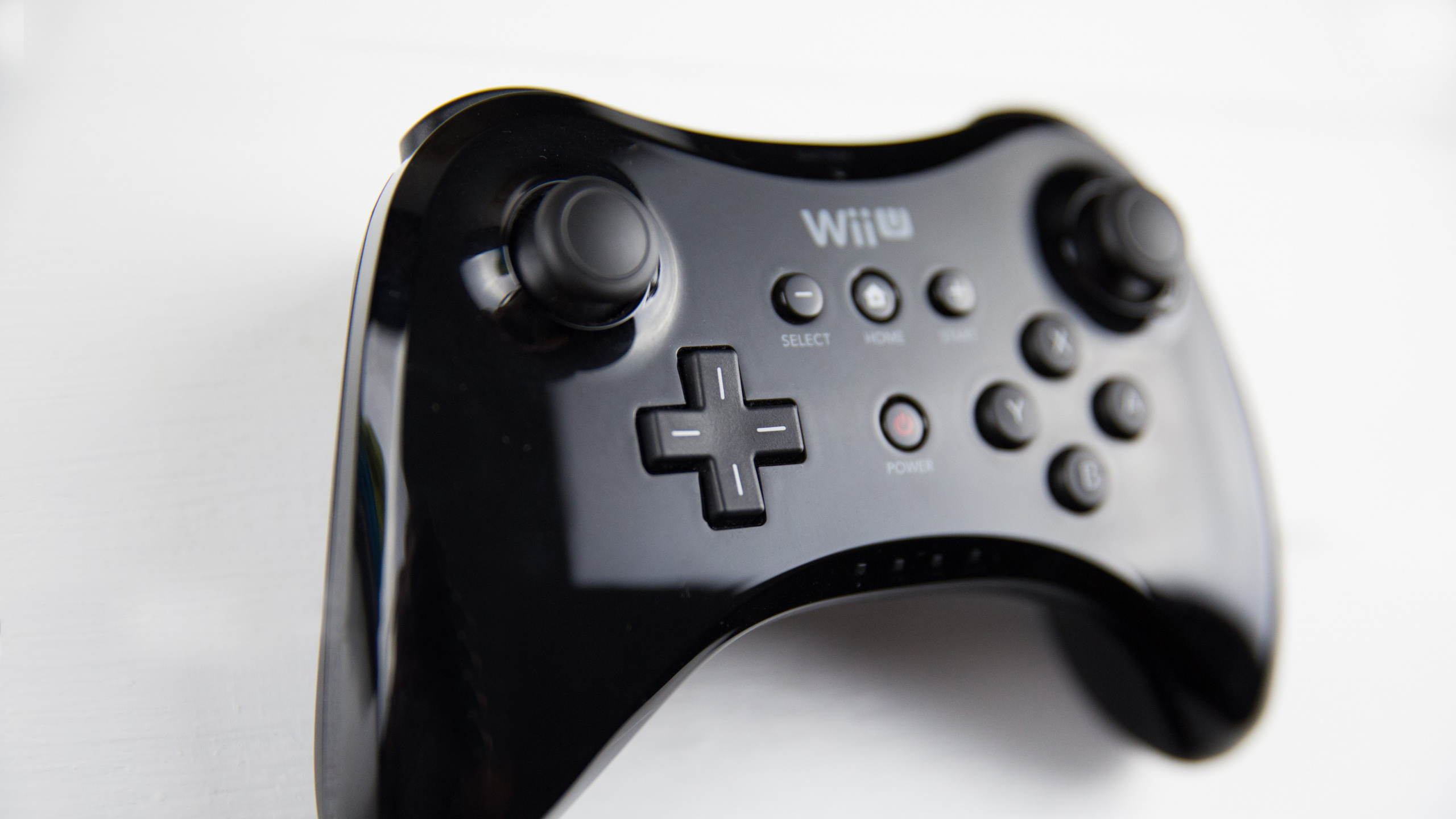 Обои гаджет, игровой контроллер, джойстик, электронное устройство, технологии в разрешении 2560x1440