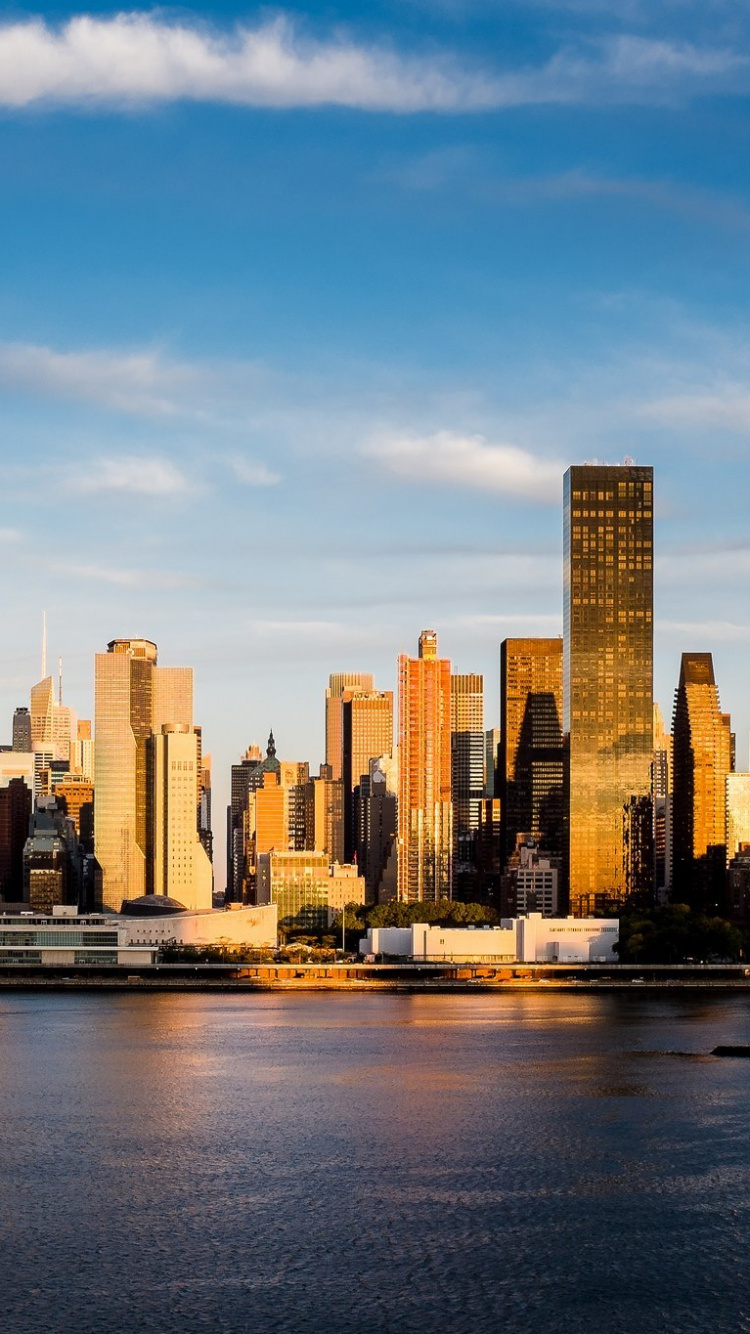 Обои линия горизонта, небоскреб, город, городской пейзаж, городской район в разрешении 750x1334