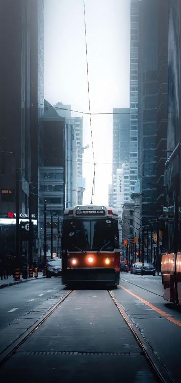 Обои здание, небоскреб, легковые автомобили, автомобильное освещение, автобус в разрешении 1422x3000